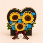 Sunflower heart box with blue chrysanthemums and baby's breath