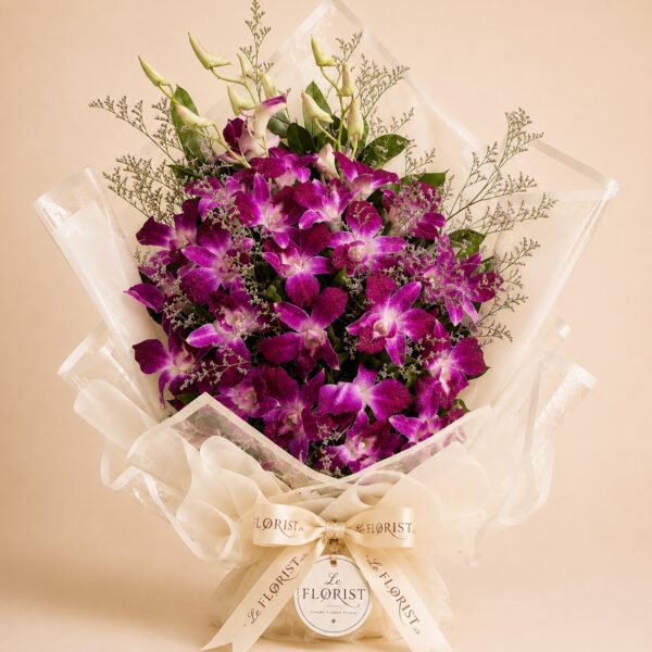 Luxury purple dendrobium orchid bouquet in ivory wrapping