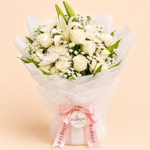 White lily rose and chrysanthemum sympathy bouquet