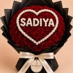 Red rose bouquet personalized with Sadiya in a white floral heart