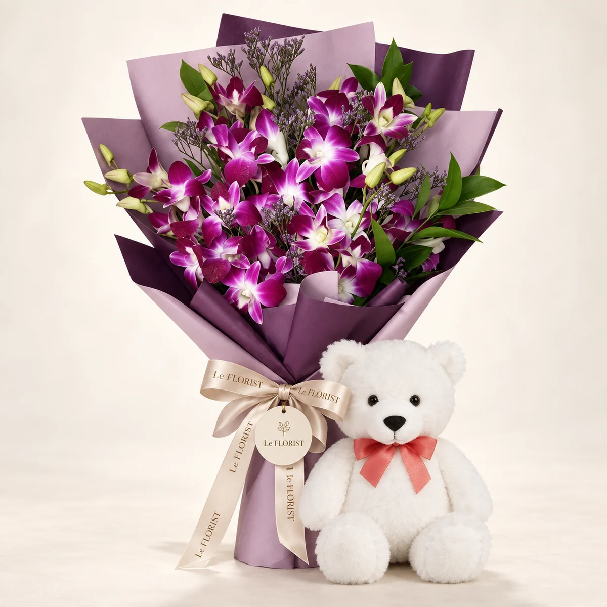 Orchid Hug – Purple Orchid Bouquet with Teddy Bear by Le Florist, flower delivery in Dhaka