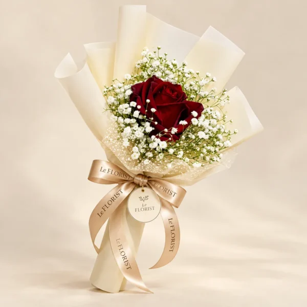 Single Red Rose Bouquet in Ivory Wrap by Le Florist, flower delivery in Dhaka