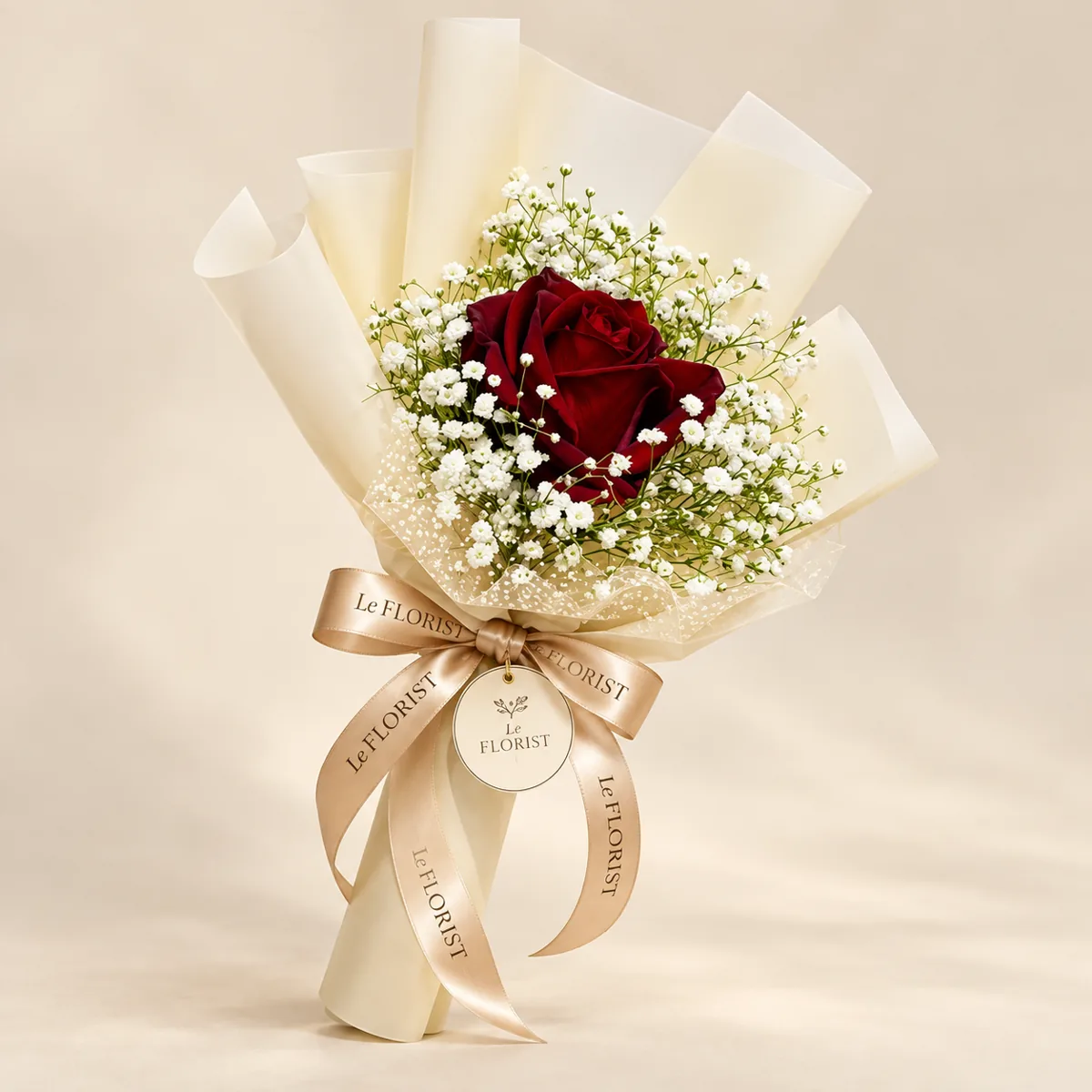Single Red Rose Bouquet in Ivory Wrap by Le Florist, flower delivery in Dhaka